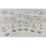 A set of 12 matching mid century Babycham stemmed glasses.