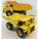 2 vintage 1980's large sized pressed steel and plastic tipper trucks by Tonka and Remco.