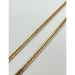 A 17" 9ct gold chunky curb chain necklace with lobster claw clasp. Clasp and both hook end links