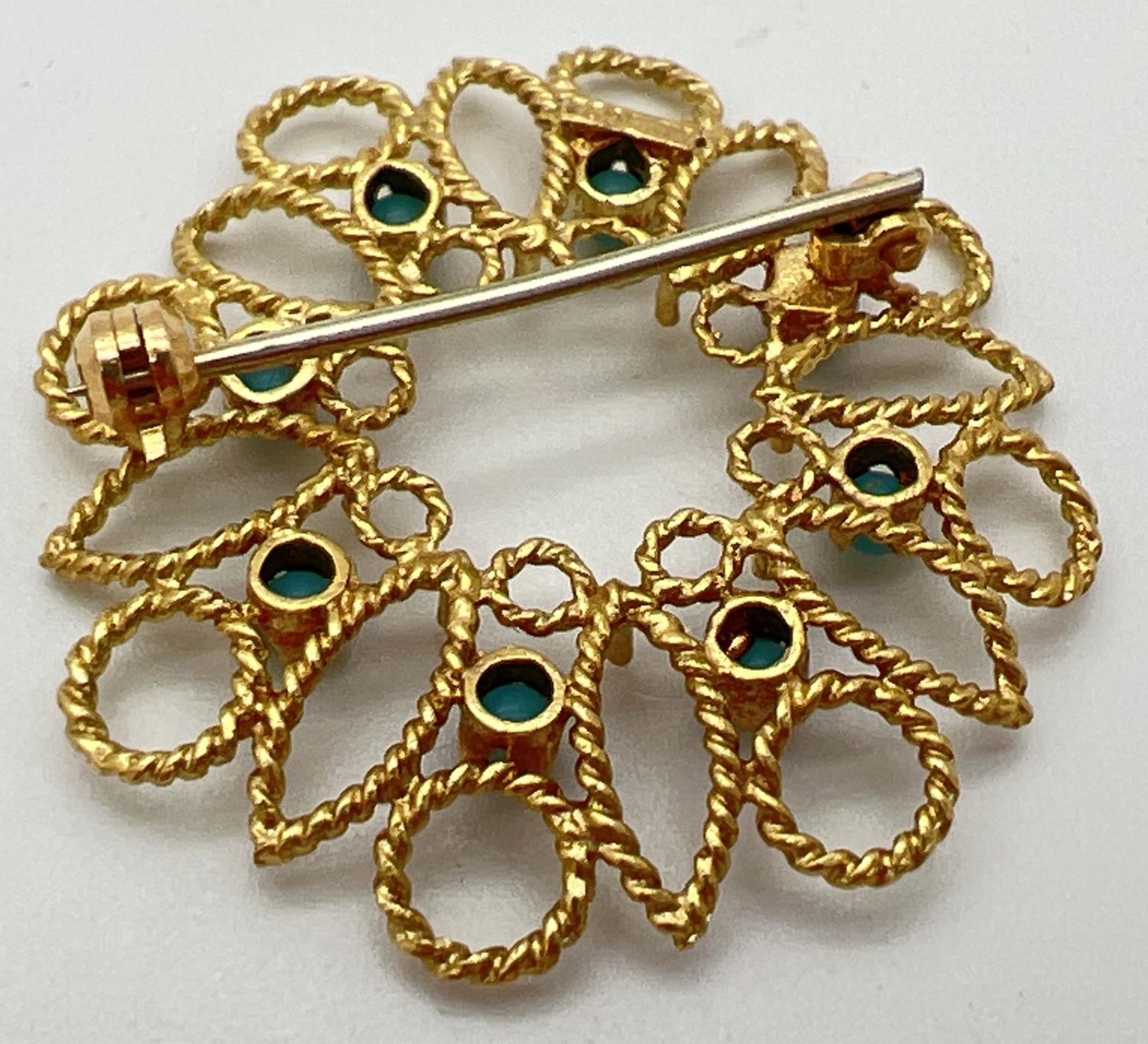 A 18ct gold open work circular brooch set with 8 small round turquoise cabochons. Secure pin to - Image 2 of 3