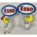 A pair of Esso painted cast iron wall plaques depicting the oil drop boy and girl mascots. With