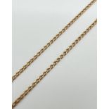 A 22" 9ct gold curb chain necklace with spring ring clasp. Gold marks to clasp and fixings. Total