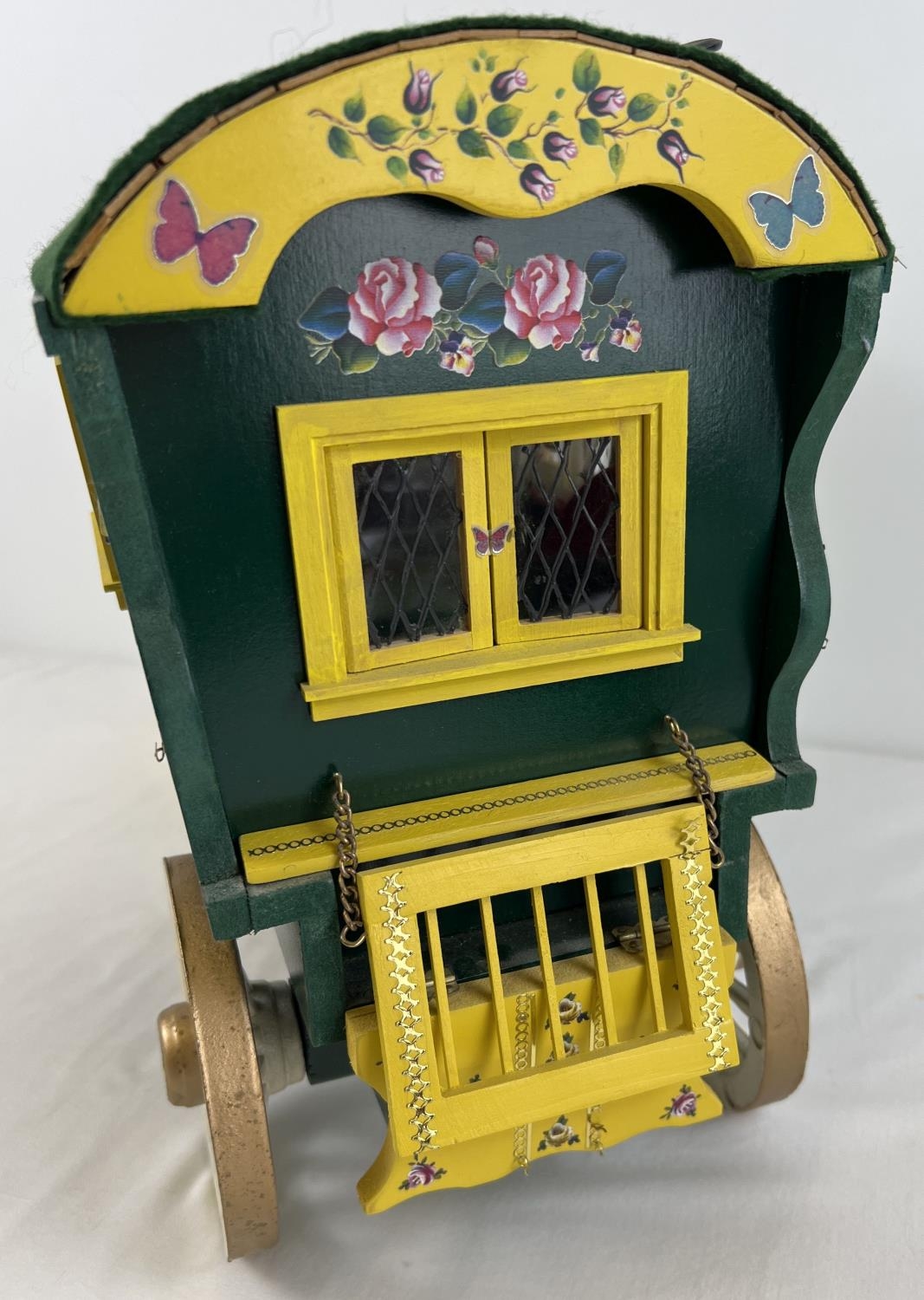 A painted wooden model of a Gypsy caravan with hand painted and sticker detail and green felt - Image 9 of 9