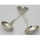 A pair of William Bateman Georgian silver ladles with engraved initial to handles. Hallmarked to