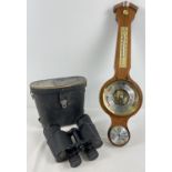 A vintage Fischer barometer together with a pair of cased Mark Scheffel binoculars. A dark wood
