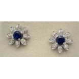 A pair of 18ct white gold, diamond and sapphire 2 in 1 adjustable flower design stud style