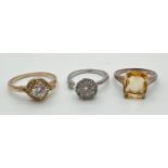 3 stone set dress rings to include cocktail style ring set with a single square set lemon quartz
