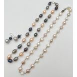 2 freshwater coloured pearl necklaces together with a pair of drop style pearl earrings. One