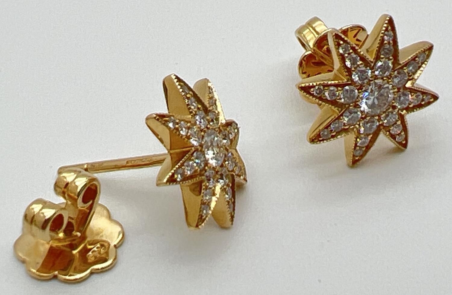 A pair of 18ct yellow gold diamond set star shaped stud earrings by Luke Stockley, London. Each - Image 4 of 4