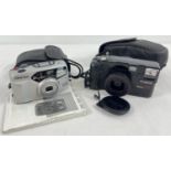 A Pentax Espio 738G camera (with zoom lens) with carry case & instruction book. Together with a