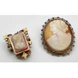 2 antique cameo brooches. An oval cameo in a pierced work mount with safety chain, marked 830 to