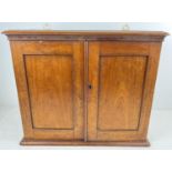 A vintage mahogany 2 door small wall hanging cupboard with adjustable interior shelf. approx. 49 x