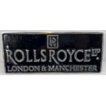 A painted aluminium Rolls Royce rectangular shaped wall plaque. With fixing holes. Approx. 10.5cm