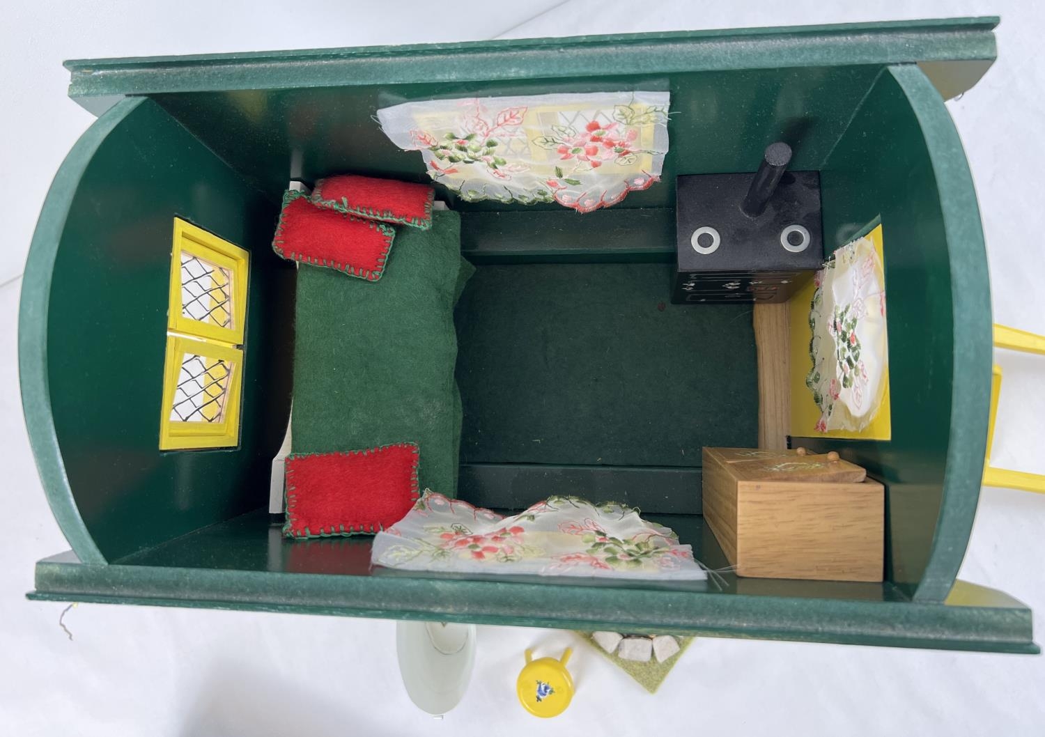 A painted wooden model of a Gypsy caravan with hand painted and sticker detail and green felt - Image 7 of 9