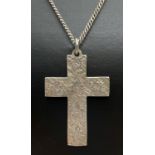 A vintage large cross pendant with engraved floral decoration to front. On a 22" curb chain with