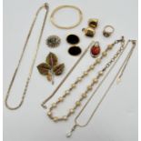A collection of assorted vintage gold tone jewellery items, to include Sarah Coventry necklace, ring