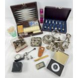 A box of assorted misc vintage items to include Crown pen shaped lighter, Apollo cigar cutter, games