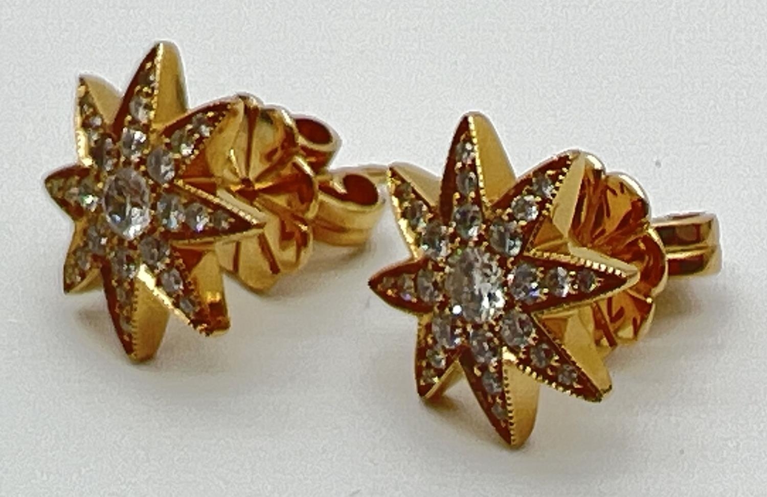 A pair of 18ct yellow gold diamond set star shaped stud earrings by Luke Stockley, London. Each - Image 3 of 4