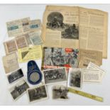A collection of vintage automobile related ephemera to include fuel ration books and photographs.
