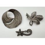3 vintage silver and marcasite set pin backed brooches. Small flower brooch stamped 925, Art Deco