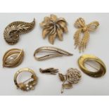 9 vintage named/branded gold tone brooches, all stamped to reverse. To include: Coro, Napier,