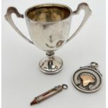 3 silver items. A small sliding pencil with small turquoise glass cabochon, a small trophy cup