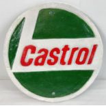 A circular shaped painted cast iron wall plaque for Castrol Oils. In green, white & red, with fixing