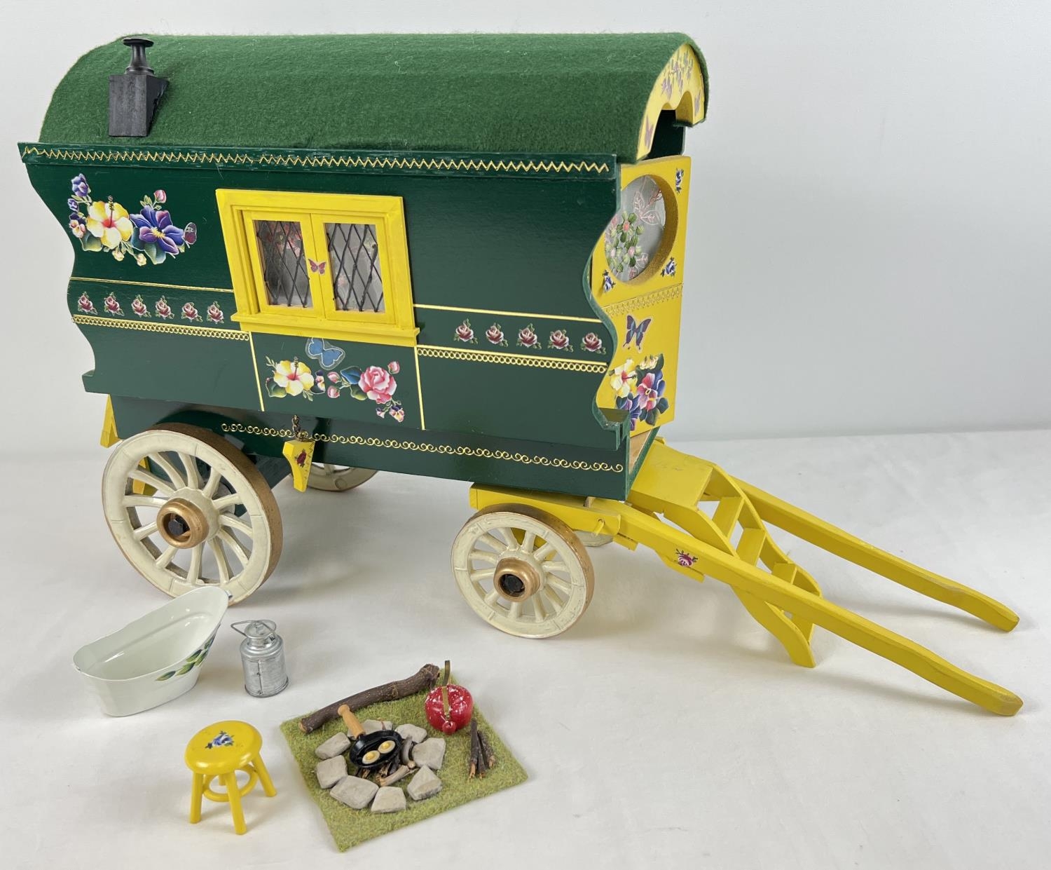 A painted wooden model of a Gypsy caravan with hand painted and sticker detail and green felt - Image 2 of 9