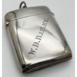 A large Edwardian silver vesta case with hinged lid and engraved name to front. Fully hallmarked for