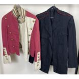 2 vintage military style short jackets. A red and cream felt jacket with brass buttons, marked
