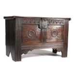 Early 17th Century oak coffer, West Country, circa 1610-1630, the rectangular top enclosing