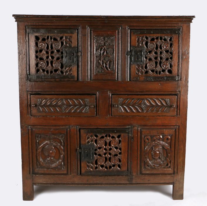 A magnificent and rare Henry VIII joined oak aumbry or livery cupboard, circa 1520, the front - Image 8 of 16