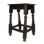 Charles II oak joint stool, Welsh circa 1680, the rectangular top with rounded edge on ball and