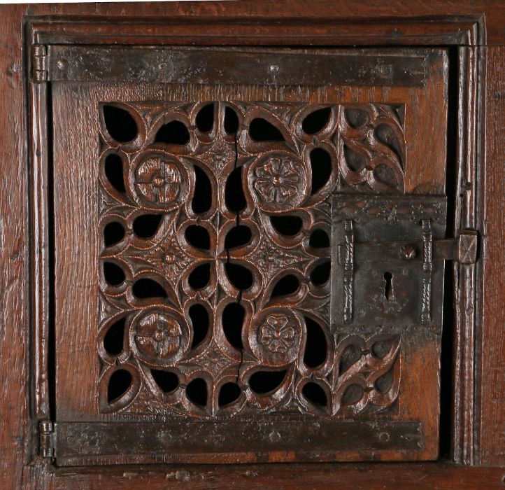 A magnificent and rare Henry VIII joined oak aumbry or livery cupboard, circa 1520, the front - Image 11 of 16