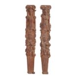 16th Century pair of carved oak terms, of a male and female in Tudor costume above a lion mask and