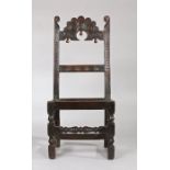 Charles II oak backstool, Yorkshire, circa 1670, having an arched splat with cusped upper edge,