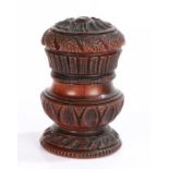 19th Century lignum vitae 'Go to Bed', the circular leaf carved top with candle holder unscrewing to