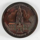 Philadelphia, PA medallion, with depiction of Independence hall to one side and the liberty bell