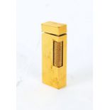 Dunhill gold plated lighter, with engine turned case, 6cm tall