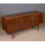 Beautility rosewood effect sideboard, fitted with four short drawers and flanked by cupboard