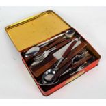 Quantity of 1960's wooden handled flatware to include dessert spoons, table forks, teaspoons,