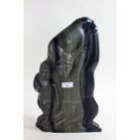 Large Canadian Eskimo Art carved soapstone figure group, 38cm tall, bearing label to the base,