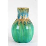 Ruskin pottery vase, the wide neck tapering into a globe body, decorated in a crystalline glaze with