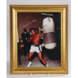 Muhammed Ali signed photograph, including COA, housed within a gilt and glazed frame, the photograph