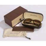 Louis Vuitton, a pair of ladies brown glitter sunglasses, with original case, box and receipt