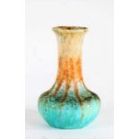 Ruskin pottery vase, the flared neck above a globe crystalline glaze body, decorated in streaked