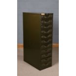 Remington Rand industrial metal cabinet, in green, fitted with eleven drawer, 36.5cm wide, 130cm