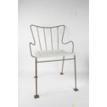 Three Ernest Race style Antelope chairs, the bare metal frames with white painted bentwood seats, on