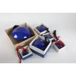 Set of five graduating Langley pottery Ocarina's, all with blue glaze, together with one other