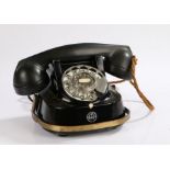 Bell Telephone company, FTTR, with a Bakelite receiver above the black and gilt decorated body